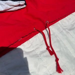 Men’s red white and dark blue puffer windbreaker